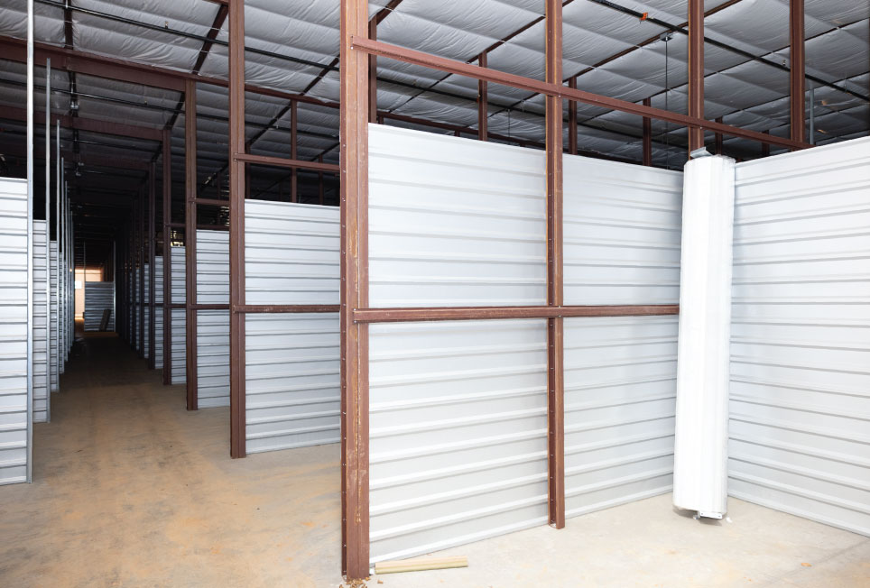 indoor self storage, self storage hallway system, hallway system case study, climate controlled self storage, A self storage, indoor storage facility design, self storage construction, self storage development, hallway systems for self storage, steel hallway system, roll up doors self storage, self storage partitions, storage unit layout design, rentable square footage self storage, storage facility efficiency, self storage build out, ground up self storage development, storage facility interior systems, self storage installation, storage facility ROI, maximize rentable space self storage, self storage leasing performance