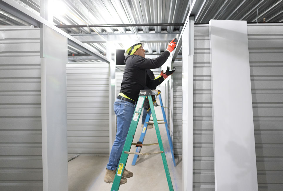 indoor self storage, self storage hallway system, hallway system case study, climate controlled self storage, A self storage, indoor storage facility design, self storage construction, self storage development, hallway systems for self storage, steel hallway system, roll up doors self storage, self storage partitions, storage unit layout design, rentable square footage self storage, storage facility efficiency, self storage build out, ground up self storage development, storage facility interior systems, self storage installation, storage facility ROI, maximize rentable space self storage, self storage leasing performance