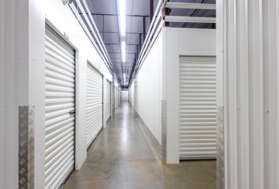 indoor self storage, self storage hallway system, hallway system case study, climate controlled self storage, A self storage, indoor storage facility design, self storage construction, self storage development, hallway systems for self storage, steel hallway system, roll up doors self storage, self storage partitions, storage unit layout design, rentable square footage self storage, storage facility efficiency, self storage build out, ground up self storage development, storage facility interior systems, self storage installation, storage facility ROI, maximize rentable space self storage, self storage leasing performance