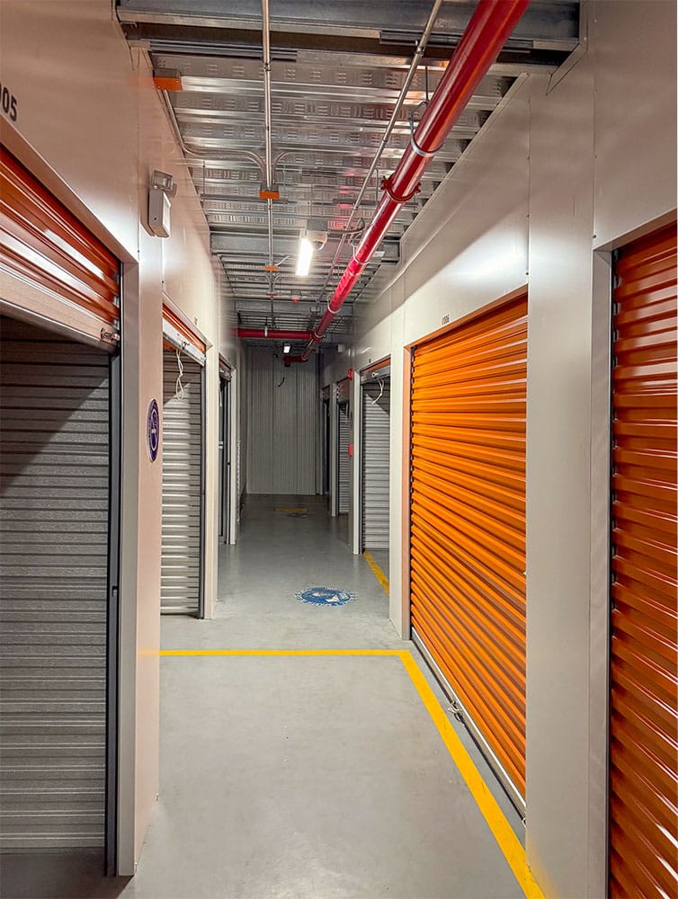 Storage units installed in the basement of a multifamily apartment building. Boxwell hallway systems offer a value-add for tenants who would like extra space on site.