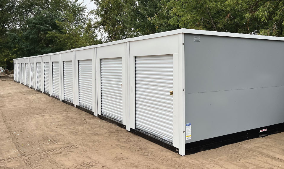 glossy white roll up doors, white roll up storage doors, self storage roll up door colors, storage facility design trends 2026, Boxwell roll up doors, Pantone Color of the Year 2026, Cloud Dancer color, modern self storage design, storage facility branding, white storage doors, outdoor storage unit design, commercial roll up doors, glossy white roll up doors for self storage, best roll up door color for storage facilities, modern storage facility exterior design, white roll up doors for outdoor storage units, self storage color trends 2026, clean storage facility design, minimalist self storage design, premium storage facility look, contemporary self storage exterior