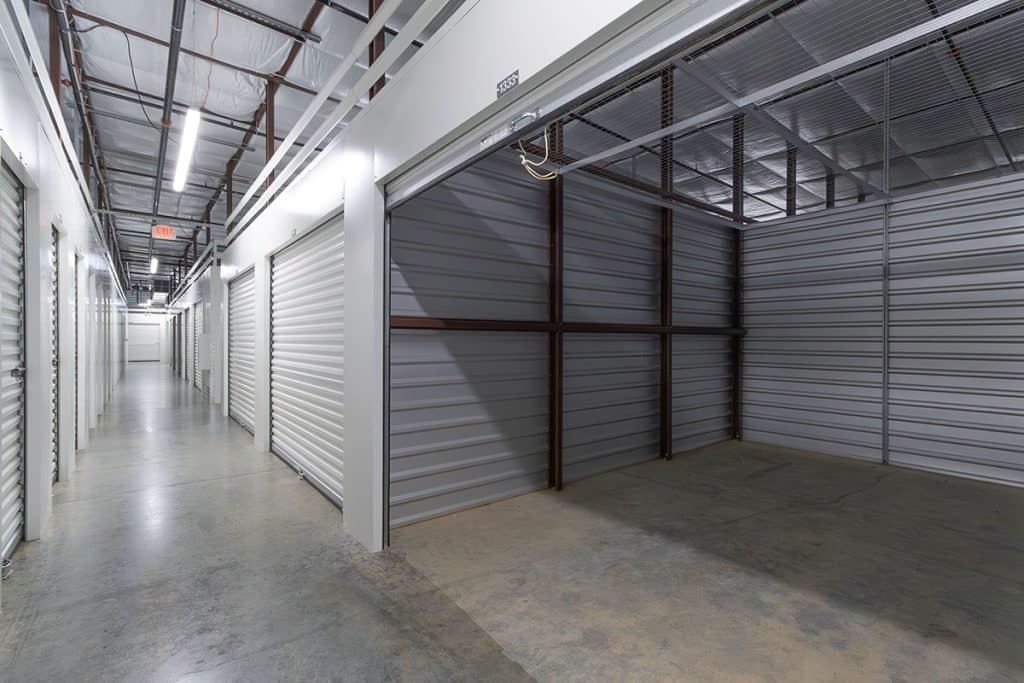 An image of a Boxwell hallway system inside an enclosed building. The all-steel construction is durable and secure.
