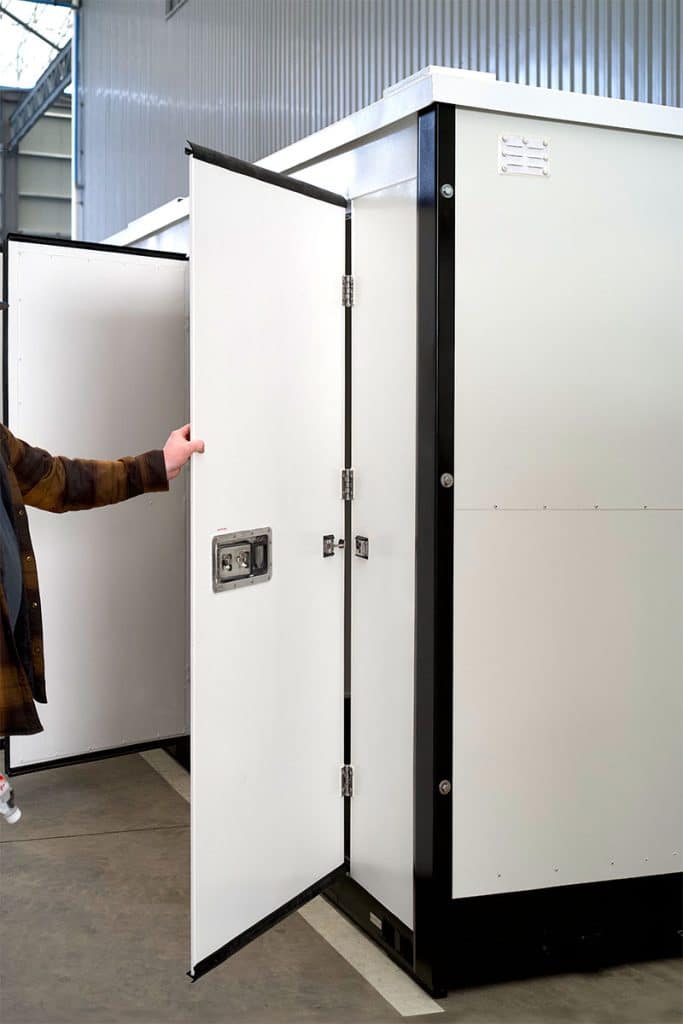 Photo of a Boxwell swing door. Ideal for portable storage, swing doors shut and seal tightly, keeping weather, wind, and dust out of the container during transport.