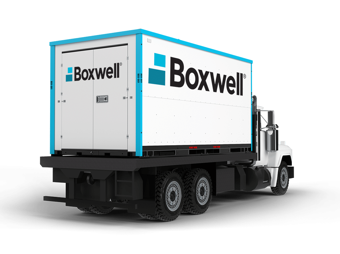 Boxwell portable storage container loaded on truck.