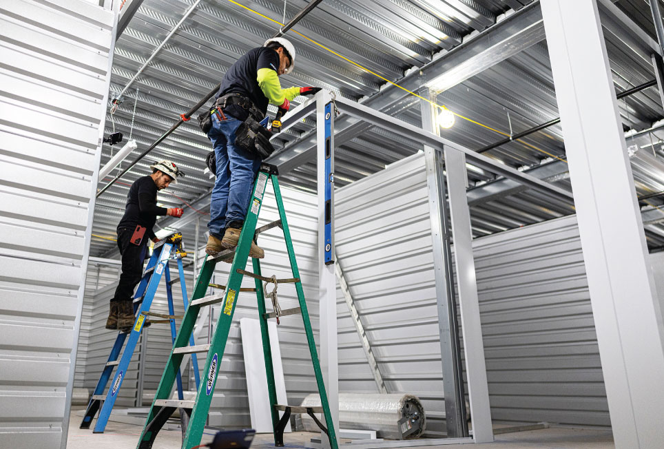 self-storage conversion, self-storage conversion guide, hallway system, self-storage hallway system, custom hallway system, self-storage facility conversion, building conversion to self-storage, self-storage design, self-storage layout design, self-storage development, self-storage construction, warehouse to self-storage conversion, retail building conversion, industrial building conversion, adaptive reuse self-storage, self-storage floor plan, storage unit layout, rentable square footage, self-storage project planning, self-storage installation, hallway system installation, self-storage manufacturing, converting a building into self-storage, self-storage conversion process, custom self-storage hallway systems, maximizing rentable square footage, self-storage facility layout planning, self-storage construction timeline, self-storage corridors, roll-up doors, wire mesh partitions, ADA-compliant storage units, self-storage operators, self-storage takeoff services, building reuse for self-storage, climate-controlled self-storage design, storage facility expansion, self-storage contractor, self-storage architect, self-storage developer, self-storage facility design, self-storage project management, self-storage buildout, self-storage renovation, commercial building conversion, storage facility construction, Boxwell hallway system, self-storage hallway manufacturer, self-storage conversion planning, self-storage conversion project, self-storage building layout, self-storage unit mix optimization, self-storage corridor design, self-storage development guide, self-storage best practices, self-storage conversion company, self-storage expansion project, self-storage infrastructure, self-storage facility planning, self-storage space optimization, self-storage revenue growth.