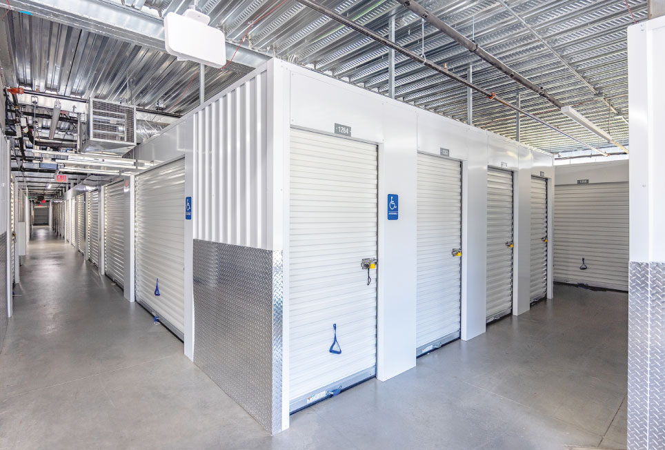 self-storage conversion, self-storage conversion guide, hallway system, self-storage hallway system, custom hallway system, self-storage facility conversion, building conversion to self-storage, self-storage design, self-storage layout design, self-storage development, self-storage construction, warehouse to self-storage conversion, retail building conversion, industrial building conversion, adaptive reuse self-storage, self-storage floor plan, storage unit layout, rentable square footage, self-storage project planning, self-storage installation, hallway system installation, self-storage manufacturing, converting a building into self-storage, self-storage conversion process, custom self-storage hallway systems, maximizing rentable square footage, self-storage facility layout planning, self-storage construction timeline, self-storage corridors, roll-up doors, wire mesh partitions, ADA-compliant storage units, self-storage operators, self-storage takeoff services, building reuse for self-storage, climate-controlled self-storage design, storage facility expansion, self-storage contractor, self-storage architect, self-storage developer, self-storage facility design, self-storage project management, self-storage buildout, self-storage renovation, commercial building conversion, storage facility construction, Boxwell hallway system, self-storage hallway manufacturer, self-storage conversion planning, self-storage conversion project, self-storage building layout, self-storage unit mix optimization, self-storage corridor design, self-storage development guide, self-storage best practices, self-storage conversion company, self-storage expansion project, self-storage infrastructure, self-storage facility planning, self-storage space optimization, self-storage revenue growth.